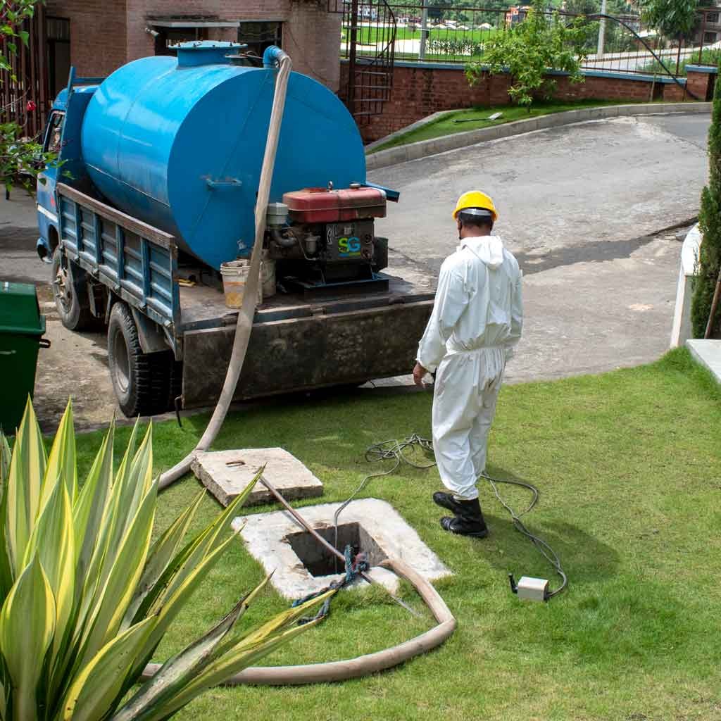 a man cleaning septic tank